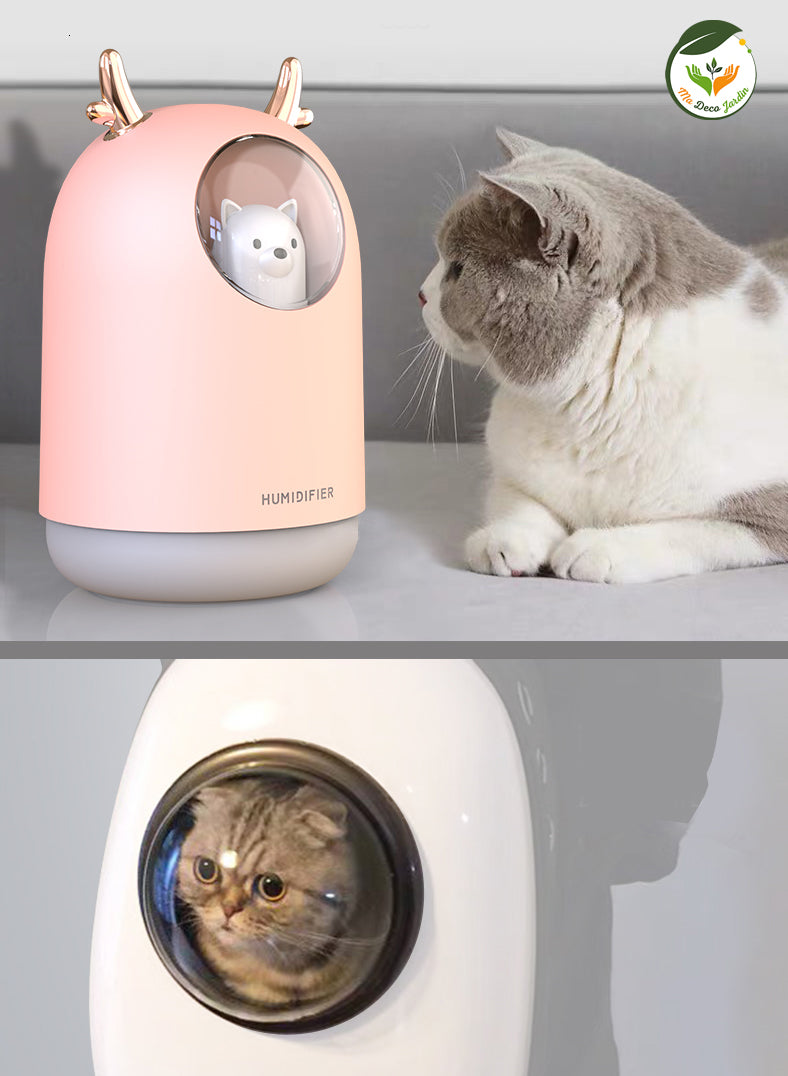 Diffuseur d'huiles essentielles design HIMIST™ avec un look moderne, entouré d'un chat curieux