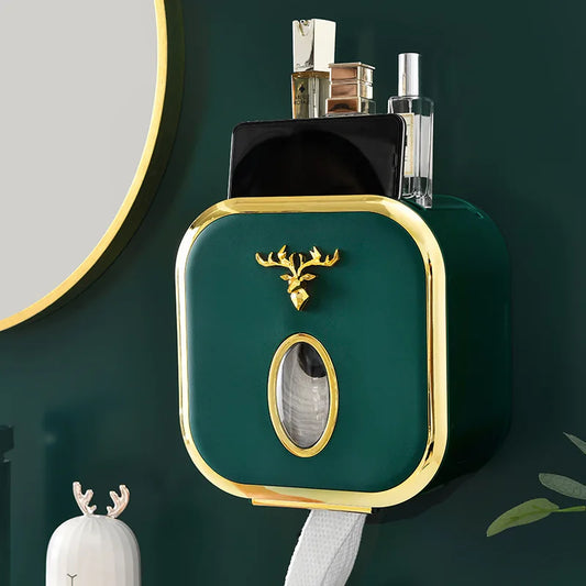 Porte papier toilette original en vert profond avec finition dorée et design élégant pour une salle de bain moderne