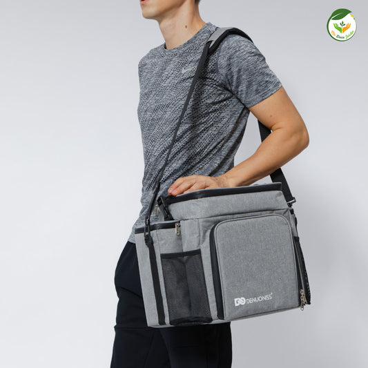 Sac isotherme DENUONISS gris porté à l'épaule, idéal pour les pique-niques et les sorties en extérieur