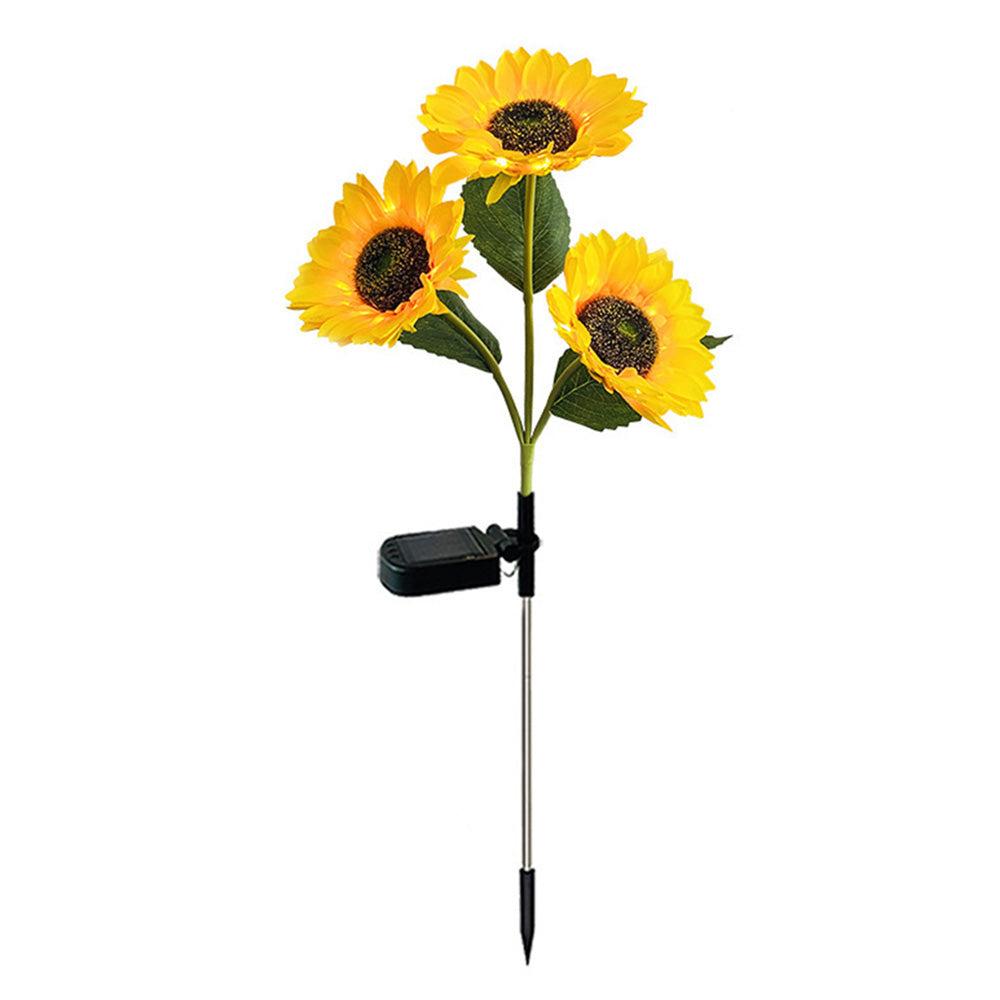 Lampe LED tournesol avec trois fleurs jaunes, idéale pour égayer votre jardin et créer une ambiance chaleureuse.