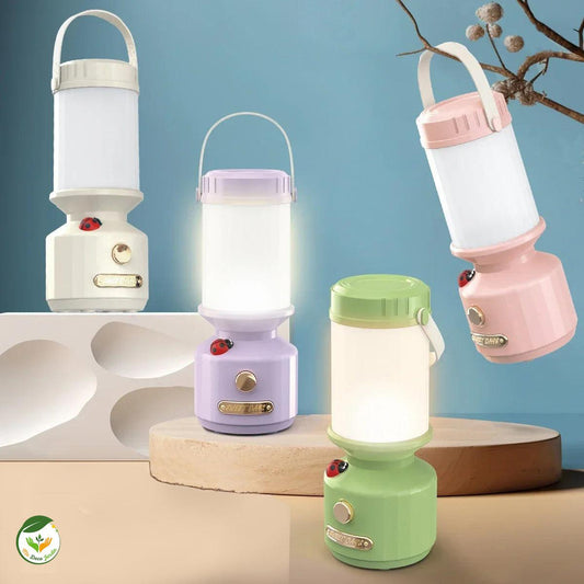 Quatre lanternes LED rechargeables colorées en pastel, idéales pour un éclairage décoratif et pratique en extérieur.