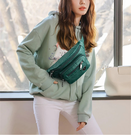 Sac banane cuir femme vert avec plusieurs poches, parfait pour un style décontracté et pratique