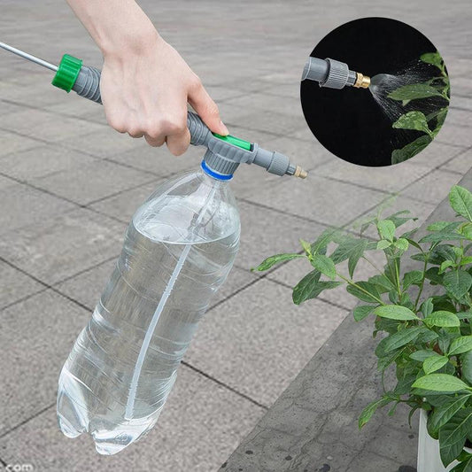 Pompe haute pression jardin connectée à une bouteille d'eau, idéale pour arroser les plantes avec efficacité