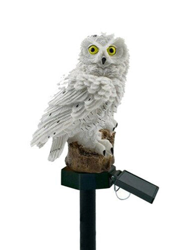 Lampe LED solaire extérieure en forme de chouette blanche avec des yeux jaunes, parfaite pour décorer votre jardin.