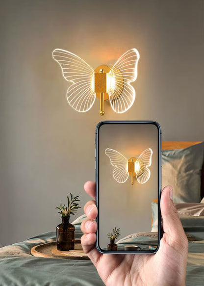 Applique murale salon moderne en forme de papillon avec éclairage LED, idéale pour décorer et illuminer votre espace.