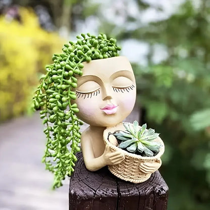 Pot de fleur original pour plantes avec un visage artistique et des cheveux en succulente, parfait pour décorer votre jardin.