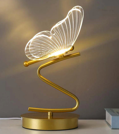 Lampe de chevet papillon élégante avec base dorée et design délicat en forme de papillon illuminé