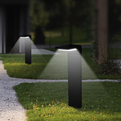 Deux lampes solaires jardin HiMISS™ éclairant un chemin en gazon, offrant un design moderne et une luminosité douce
