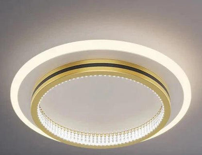 Plafonnier LED moderne en forme ronde avec finition dorée et éclairage décoratif élégant, parfait pour embellir votre intérieur