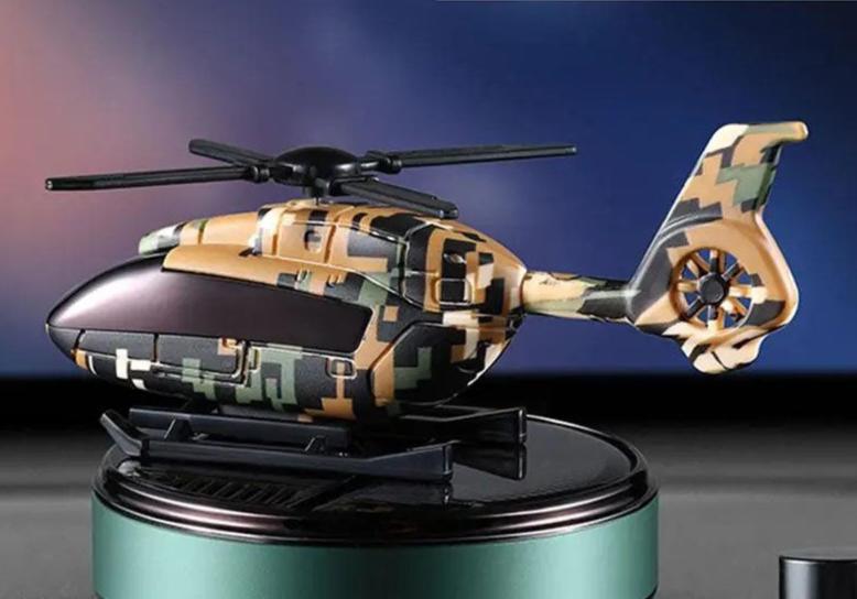 Purificateur d'air compact voiture HELICO™ au design moderne avec camouflage, idéal pour un intérieur frais et agréable.
