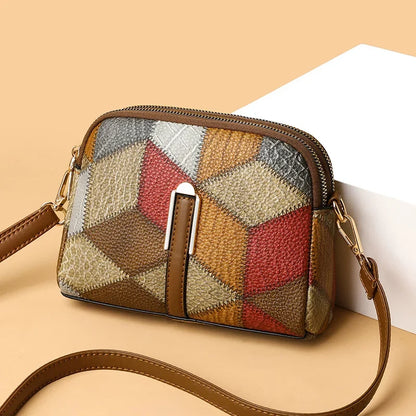 Sac bandoulière femme chic avec motif en losanges colorés et bandoulière réglable parfait.