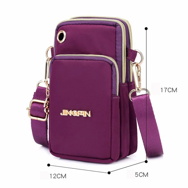 Sac bandoulière femme en violet pratique pour sorties, avec plusieurs compartiments et une bandoulière ajustable