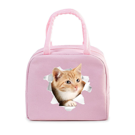 Sac isotherme pour chats de couleur rose avec un mignon chaton à travers une ouverture, idéal pour transporter votre animal