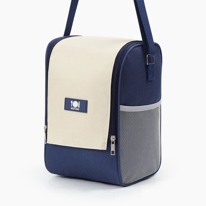Sac isotherme Oxford en bleu marine avec poche filet, idéal pour garder les aliments frais lors des pique-niques.