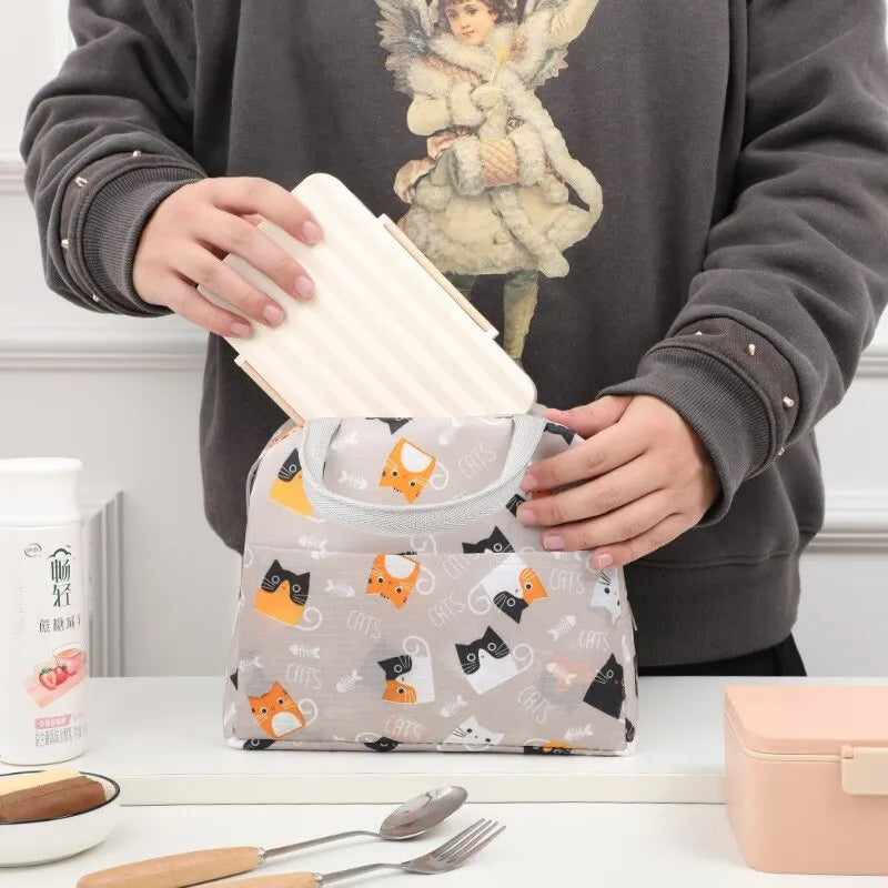 Sac isotherme original avec motifs de chats, idéal pour transporter des repas et garder vos aliments frais