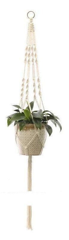 Support pot de fleur suspendu en macramé avec une plante verte, parfait pour décorer votre intérieur avec style