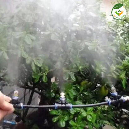 Brumisateur terrasse en fonctionnement, diffusant une brume fine au-dessus des plantes pour un rafraîchissement idéal