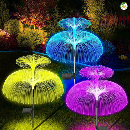 Guirlande lumineuse solaire colorée avec effets d'eau en LED, illuminant un jardin en pleine nuit