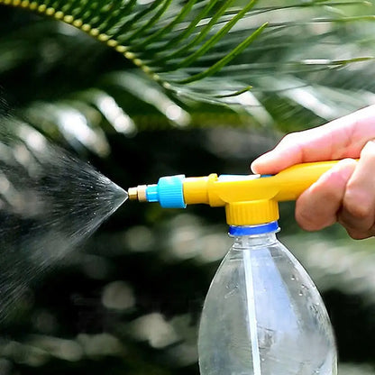 Pompe haute pression jardin incluse, pulvérisateur jaune monté sur bouteille pour arroser les plantes efficacement.