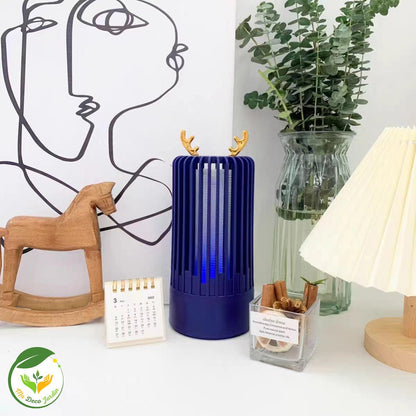 Lampe anti moustiques efficace MONTINIGRO en bleu, décorative et modernisée, idéale pour l'intérieur et l'extérieur.