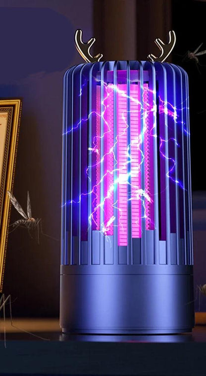 Lampe anti moustique écologique avec conception en cerf, émettant une lumière violette pour capturer les insectes efficacement