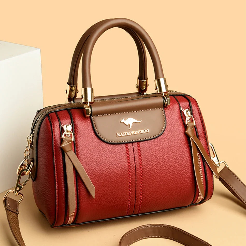 Sac femme style haut de gamme en cuir haut de gamme de couleur rouge avec poignées élégantes
