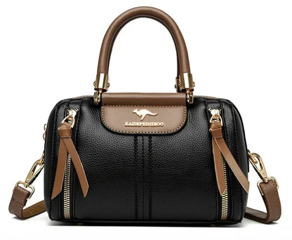 Sac femme style haut de gamme en cuir haut de gamme noir avec poignées en cuir marron.
