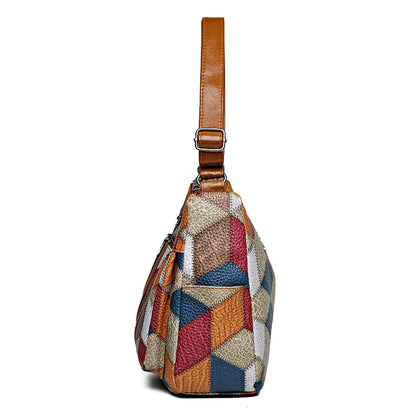 Sac vintage femme en cuir avec un design élégant et unique, présentant des motifs géométriques colorés