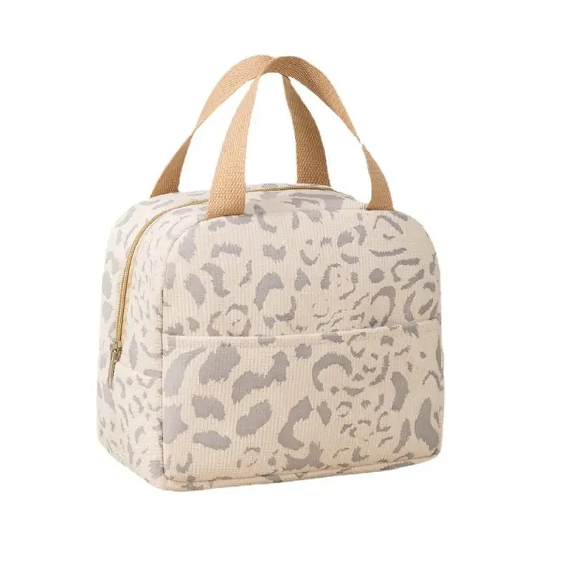 Sac isotherme tissu avec motif léopard et poignées en sangle, idéal pour le déjeuner