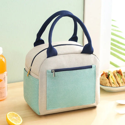 Sac isotherme enfants avec un design moderne et une poche arrière, idéal pour les repas scolaires